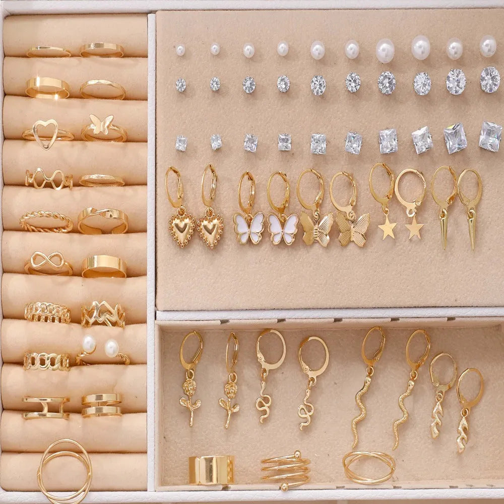 108 gold and yellow alloy geometric pearl earrings set for women displayed together.