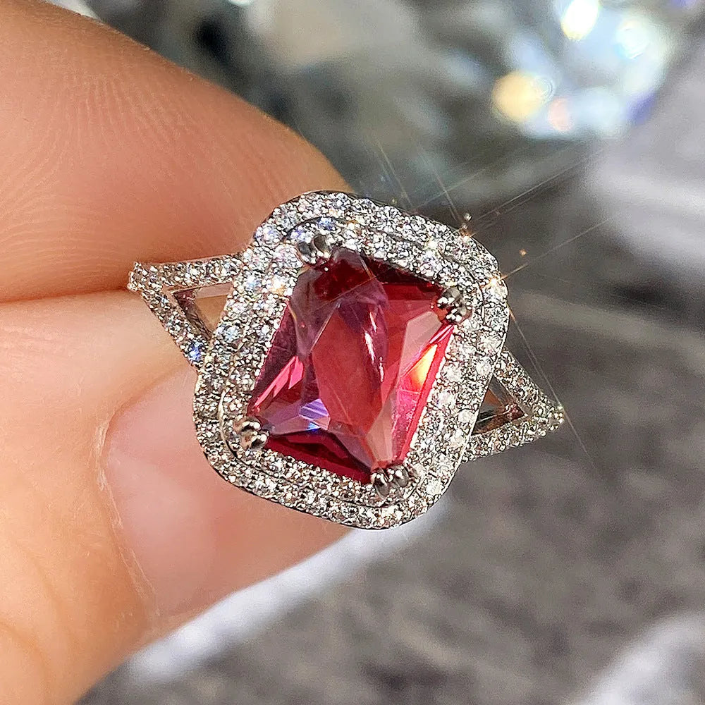 Copper square princess ring with rhinestone centre in F827 red colour, showing geometric design details