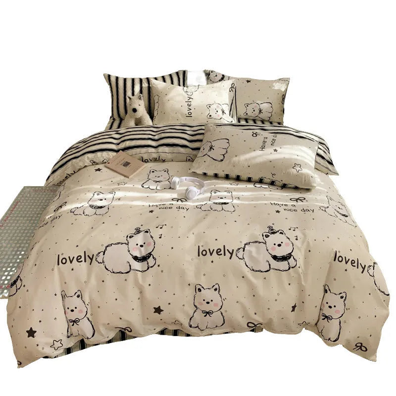 Cartoon dog pattern four-piece cotton bed sheet set showing bedding components