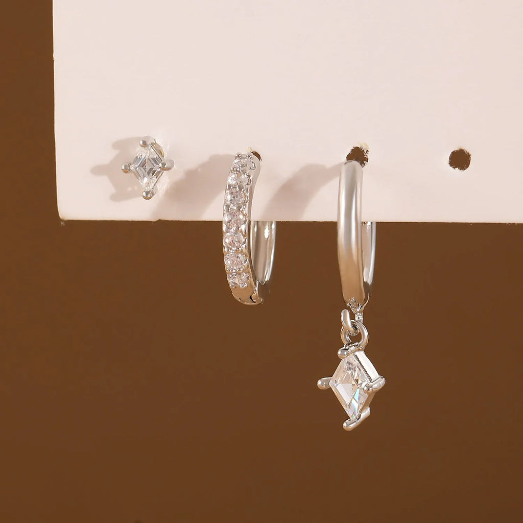 Ladies three-piece earring set with geometric designs and inlaid zircon accents