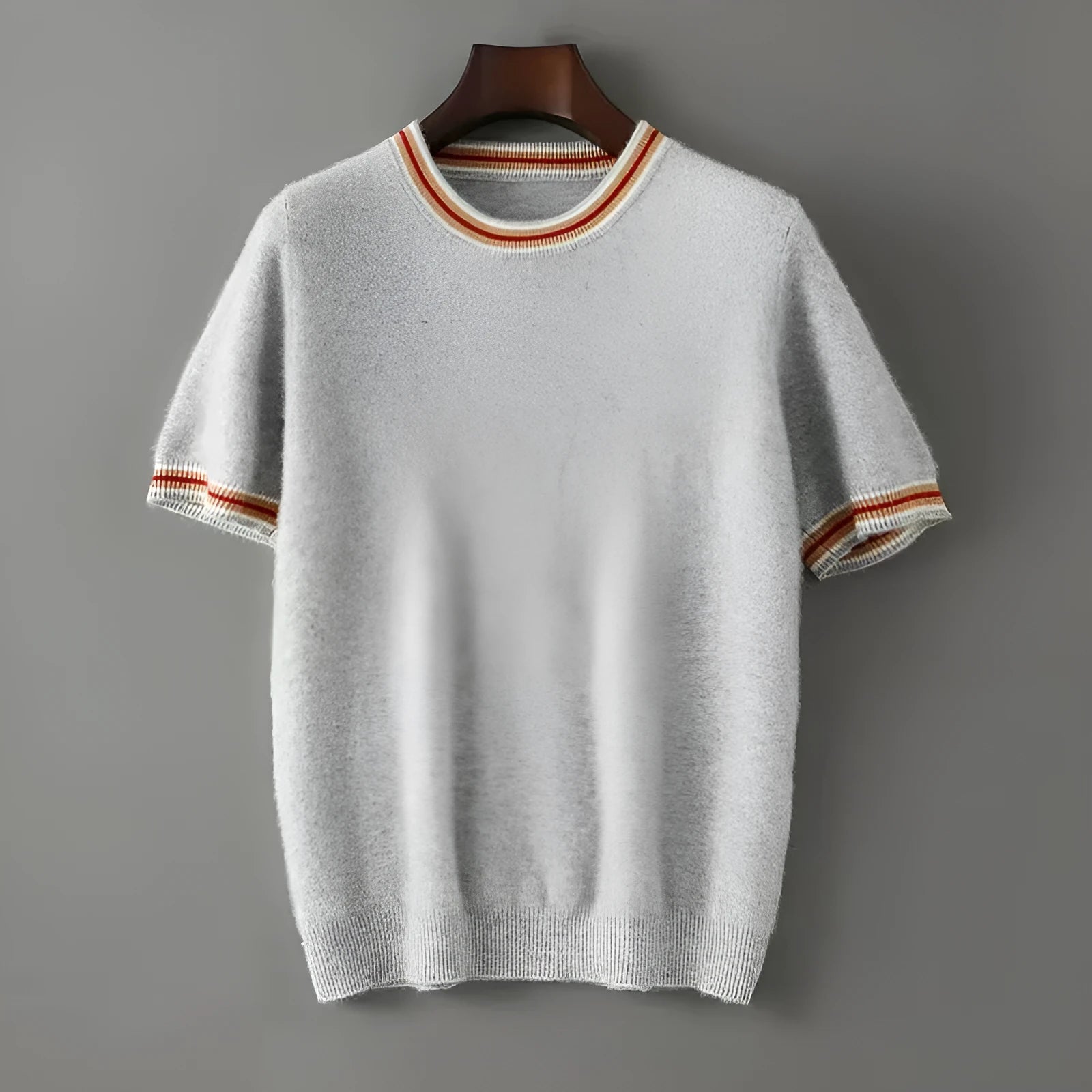 Men's grey pure wool short sleeve round neck sweater laid flat showing pullover design