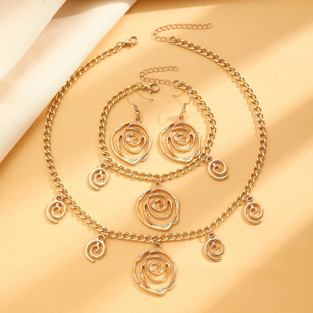 Spiral donut geometric jewellery set with necklace bracelet earrings in gold finish