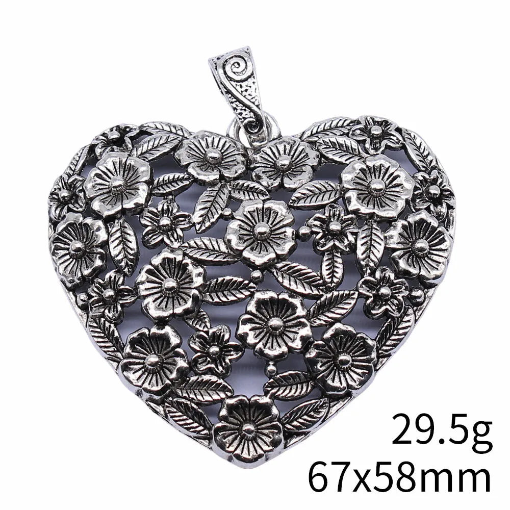 Hollow flower love pendant in ancient silver alloy measuring 67x58mm