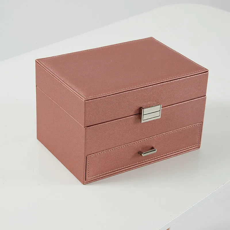 Hard-sided rectangular jewellery storage box in beige PU leather with lid closed