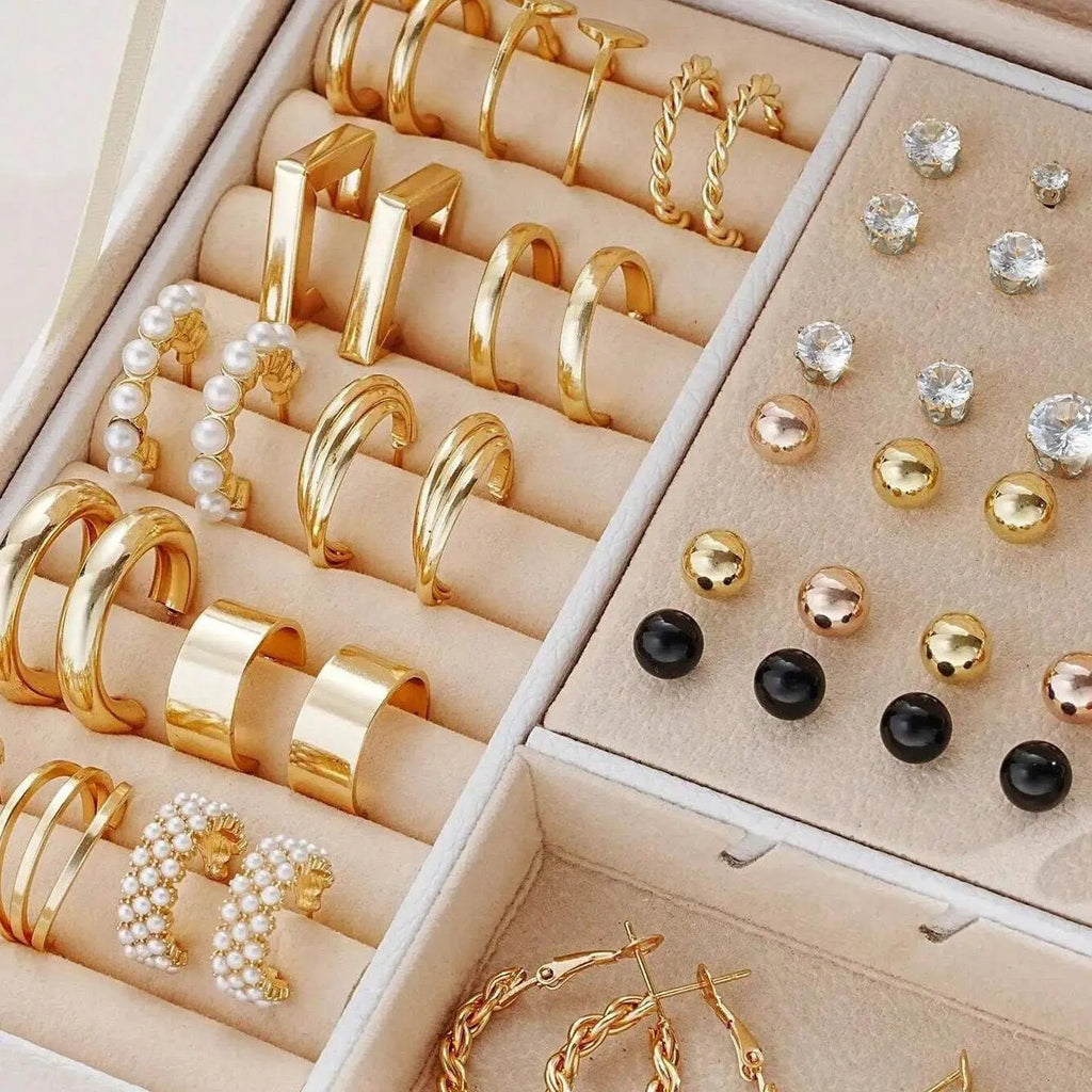108 gold and yellow alloy geometric pearl earrings set for women displayed together.