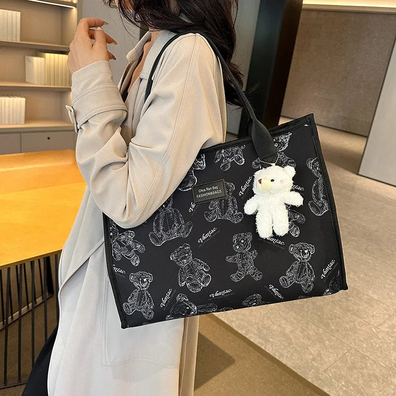 Women's large capacity canvas tote bag with rhombus pattern and sandwich pocket in black or white