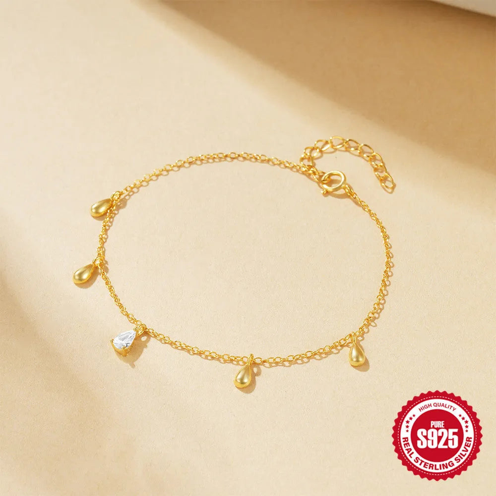 Gold S925 sterling silver water drop diamond pendant bracelet for women on white background