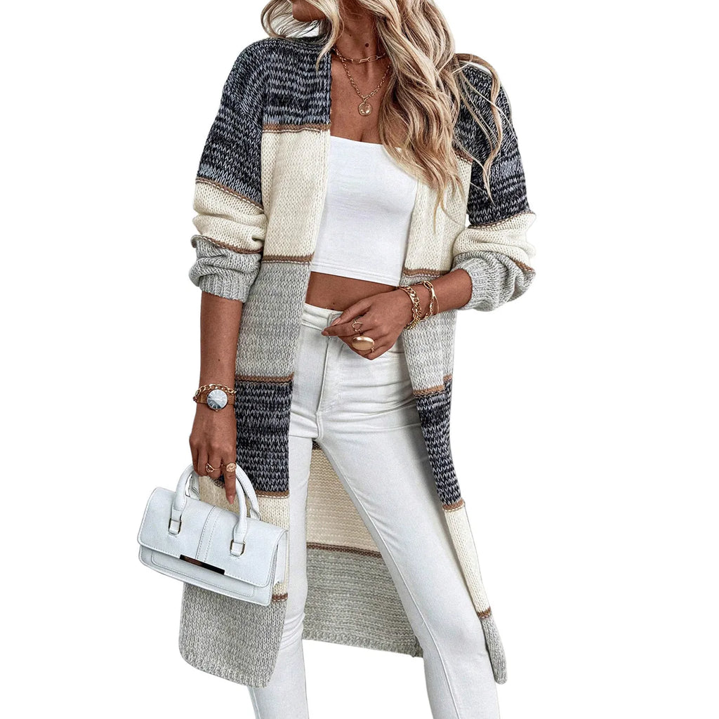 Women's grey striped knitted cardigan with long sleeves and loose fit design