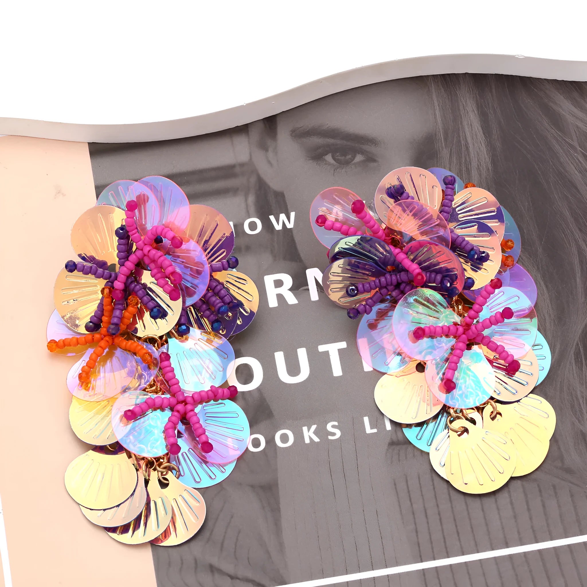 Handmade beaded flower earrings with exaggerated string bead designs in colourful, rose and purple colours