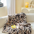 Handmade striped chenille cover blanket showing texture, displayed in caramel mango colour