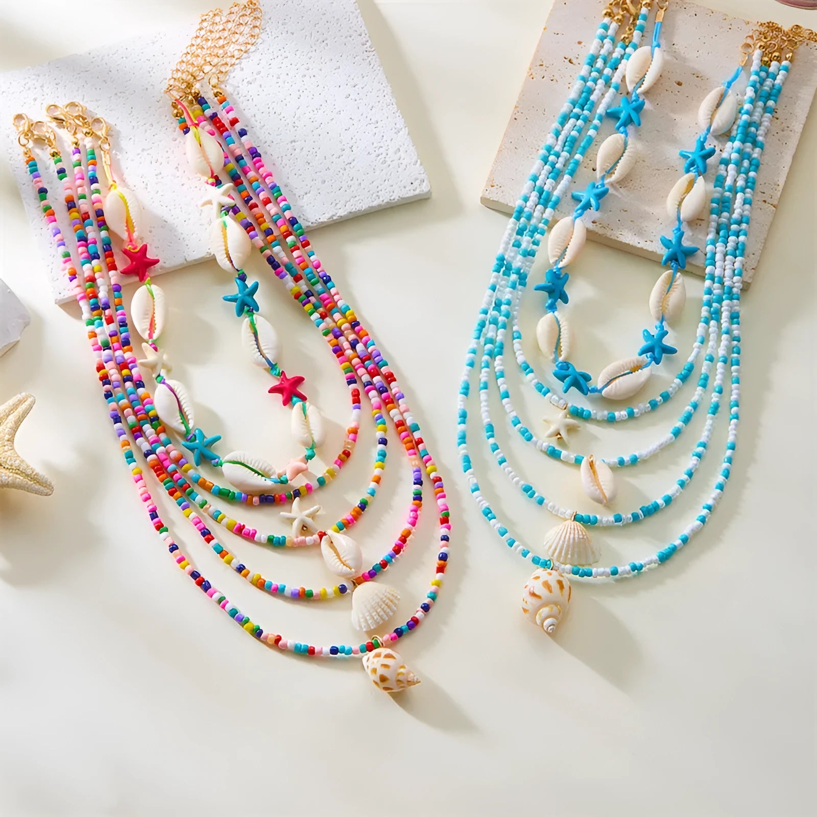 Women's five-piece shell bead necklace set with adjustable length showing blue and coloured variants