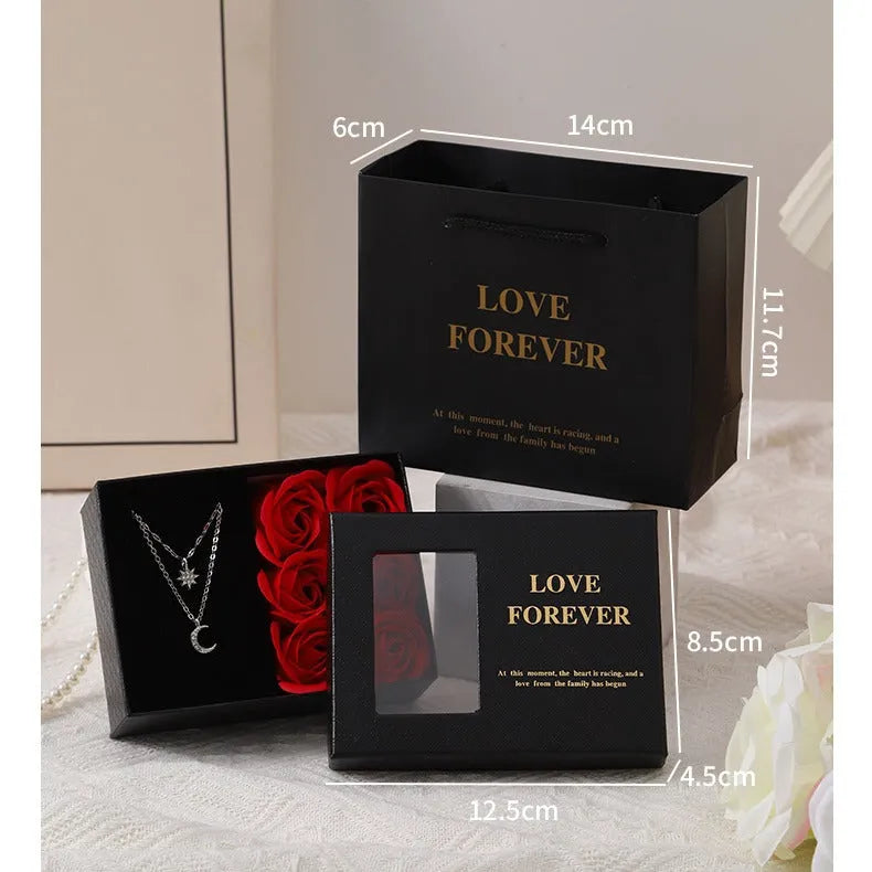 Korean style gift box with six red soap roses and a matching handbag for Valentine's Day.