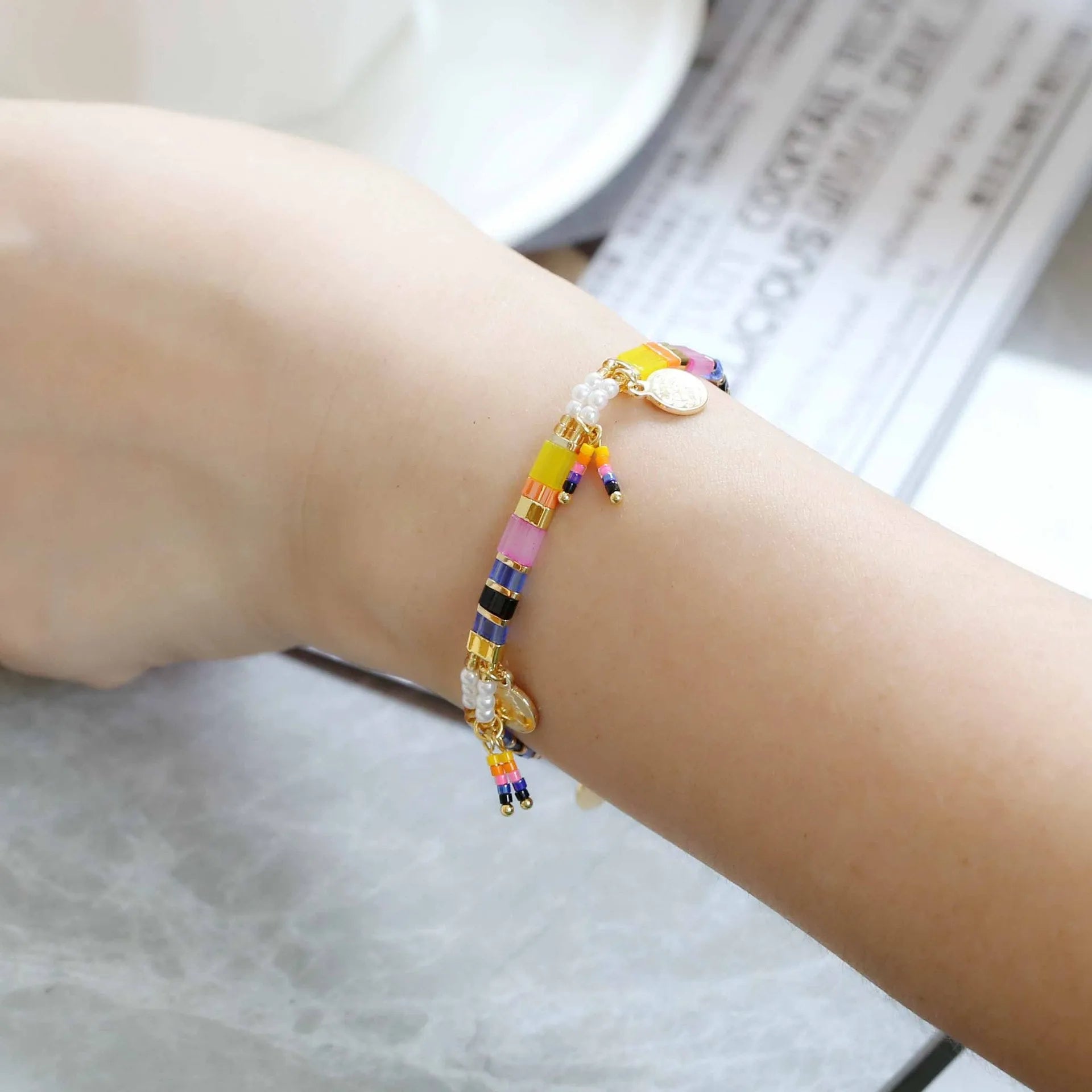 Women's manual beaded bracelet with imitation pearl and coloured glass beads in six style options