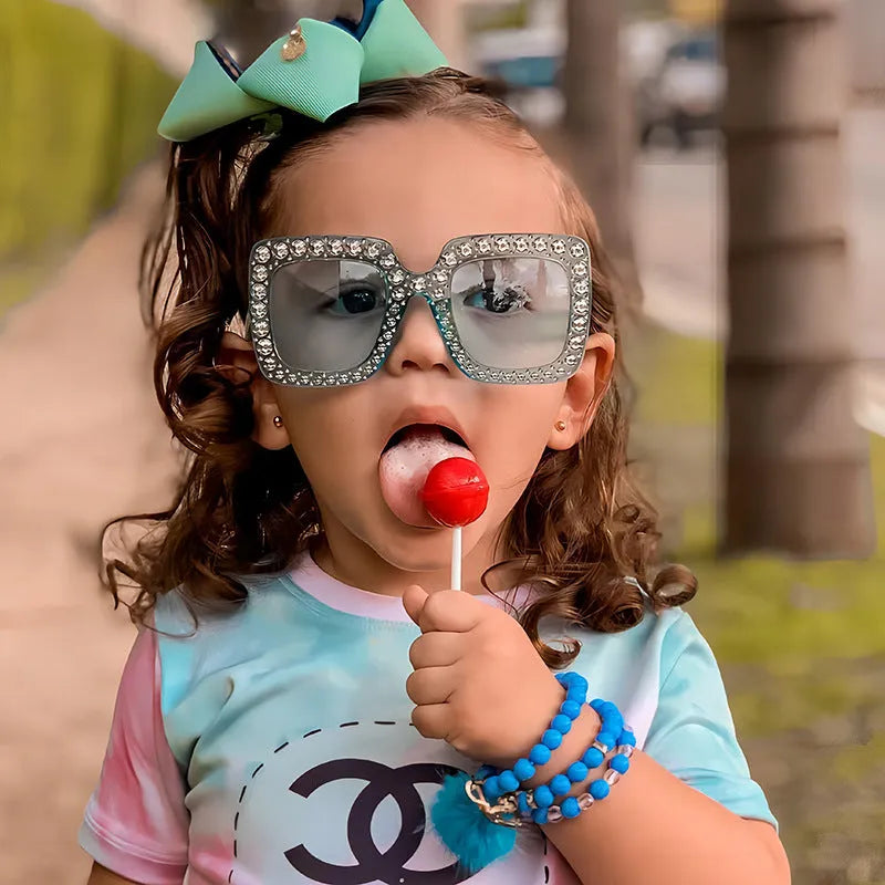 Plastic box sunglasses with black frame and gray lenses for sun protection