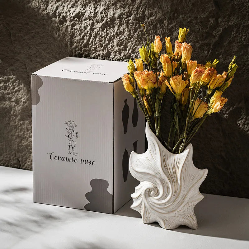 European retro style ceramic vase with a coloured glaze finish on a wooden surface.