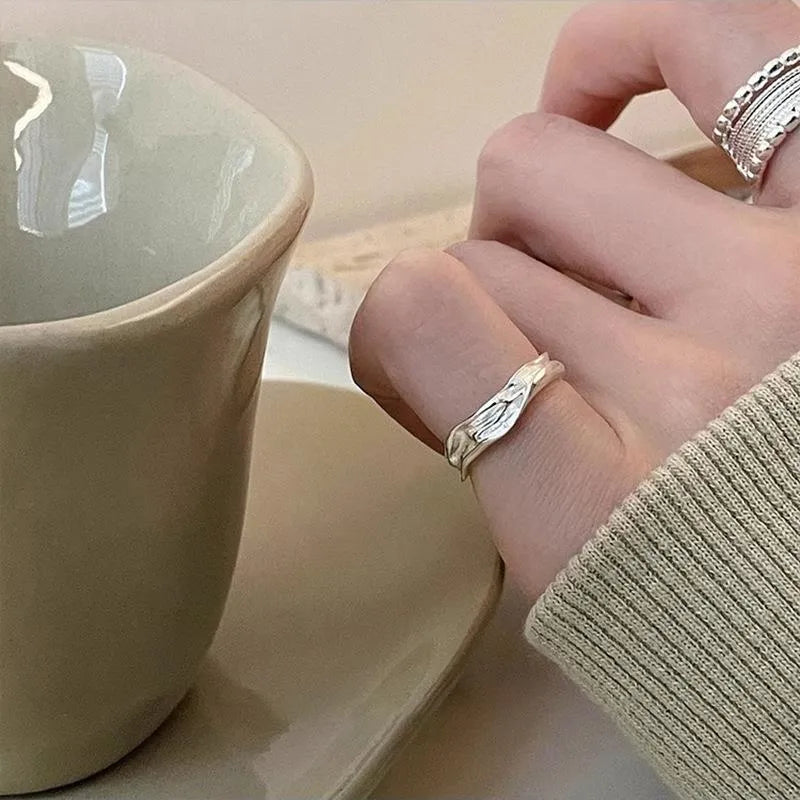 Women's copper alloy ring with woven twisted multilayer geometric design and adjustable opening