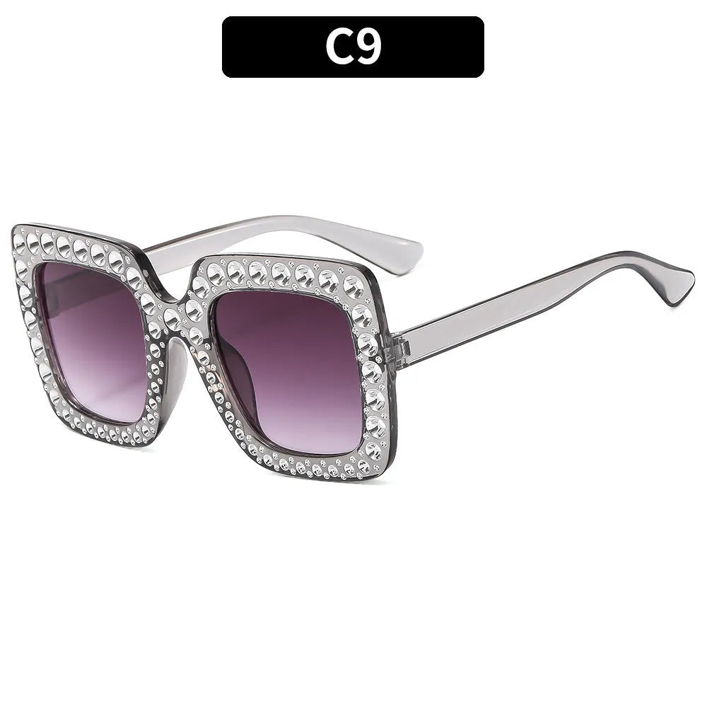 Plastic box sunglasses with black frame and gray lenses for sun protection
