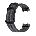 Fitbit Charge nylon replacement strap with a three-ring metal buckle shown in multiple colour options.