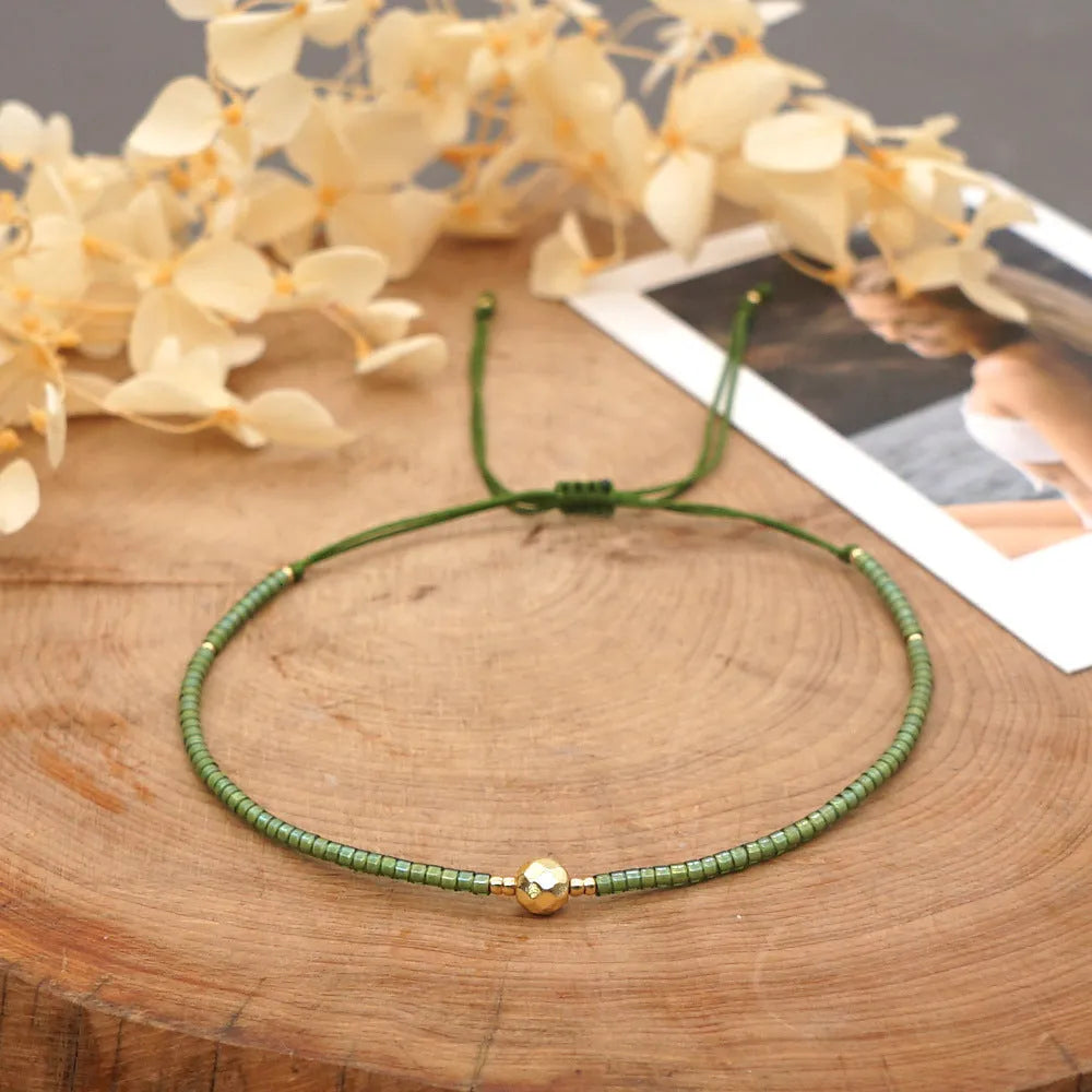 Bohemian style women's bracelet with semi-precious stone and colourful glass beads on adjustable fastening