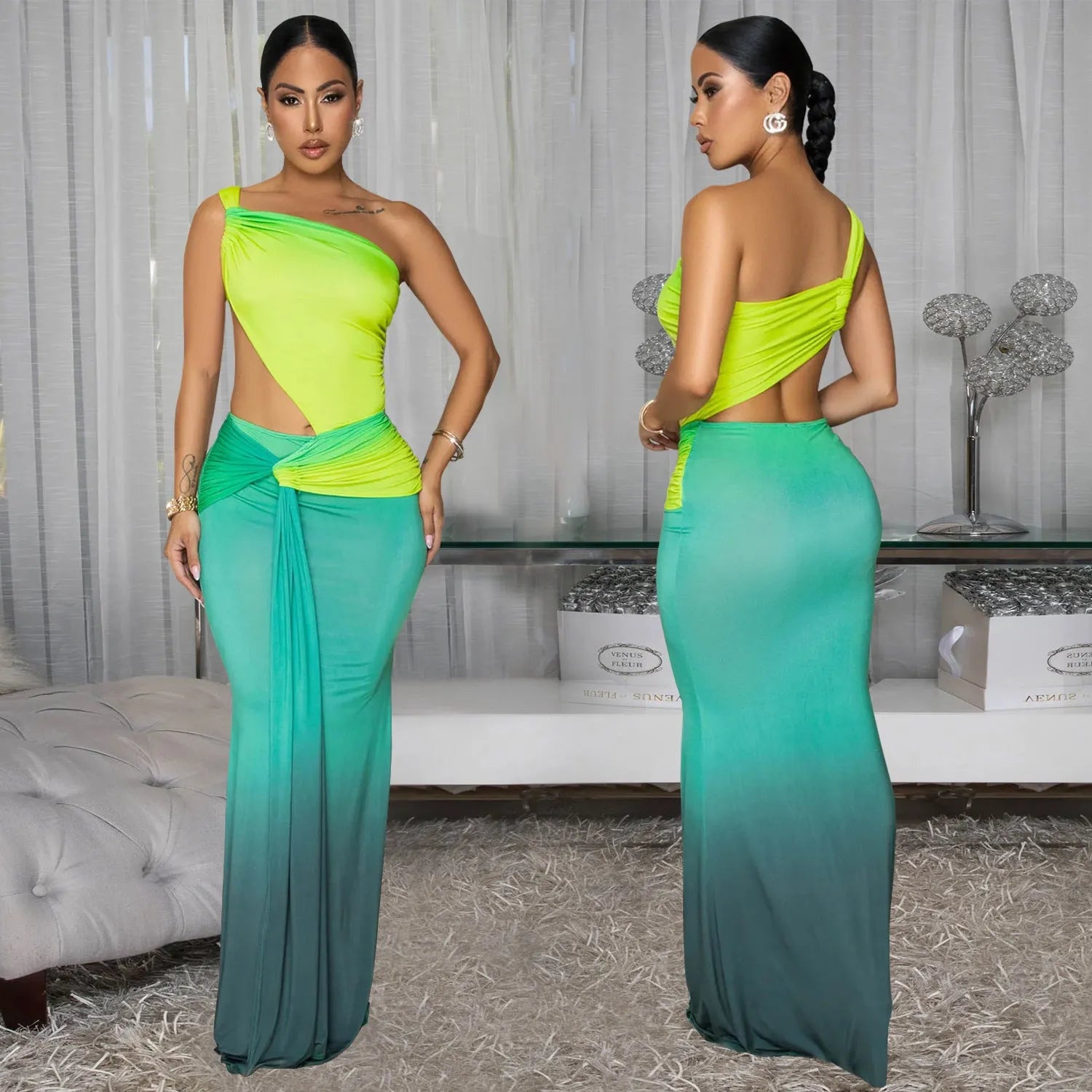 A woman's gradient colour cross-shoulder sleeveless dress with a high waist and long skirt.