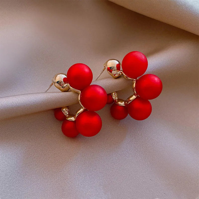 Red bell-shaped alloy ear rings for women with hook fitting, also available in white