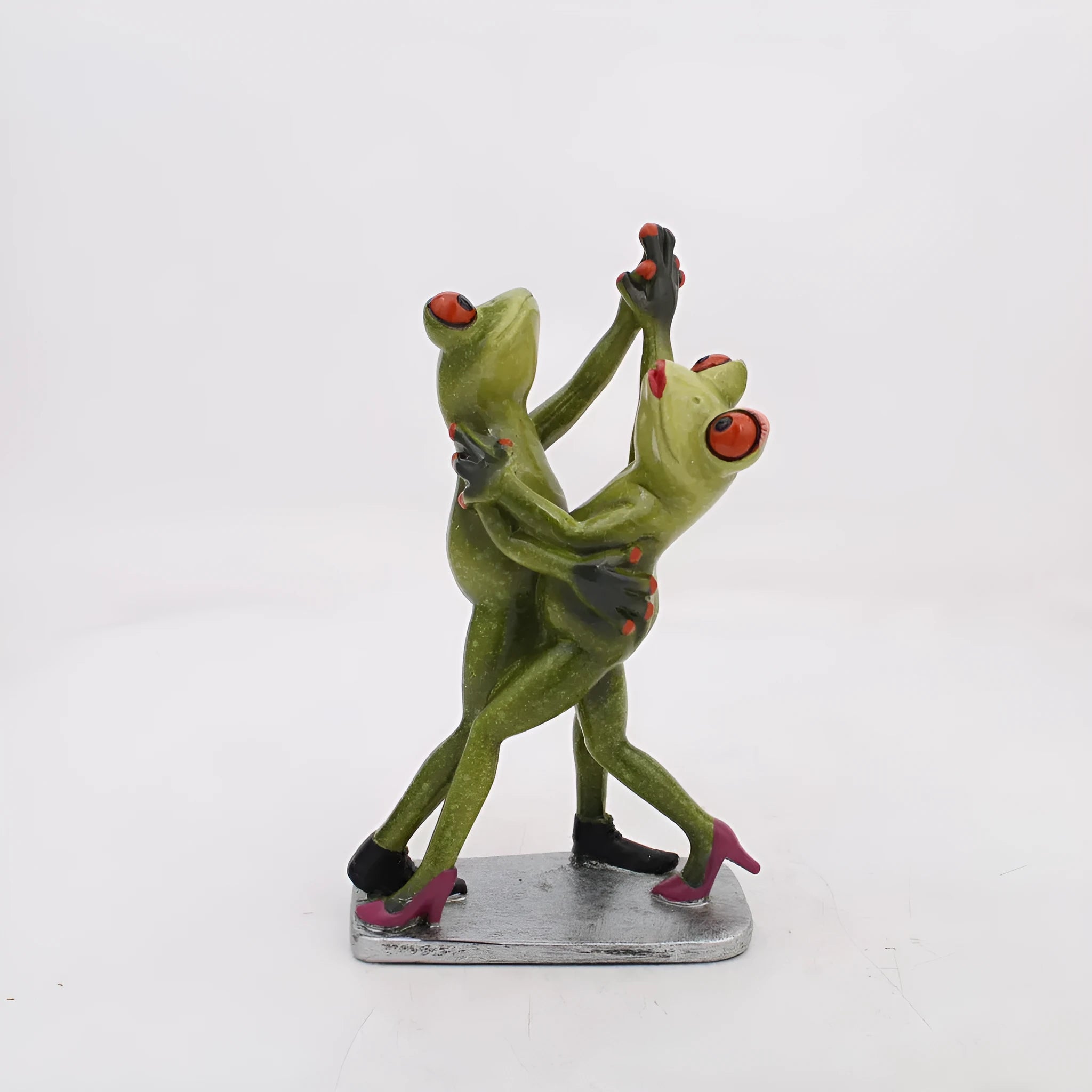 Green resin frog sculpture measuring 6cm high with rustic pastoral detailing for shelf or desk decoration