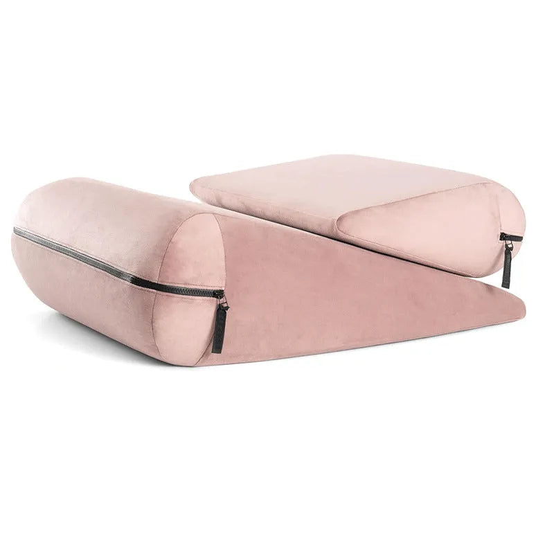 High density sponge triangle wedge pillow with embroidery detail in various colours.