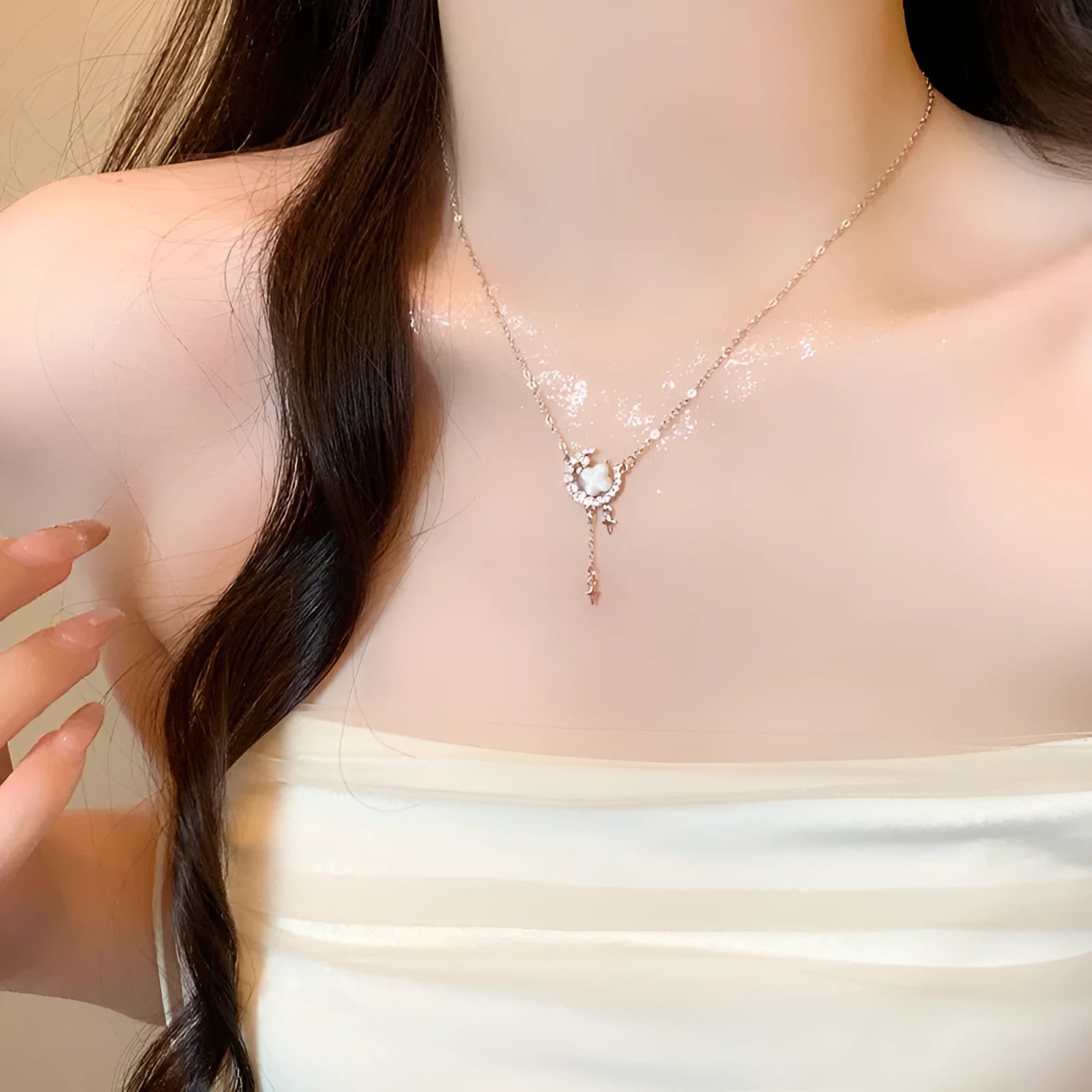 Women's star-shaped necklace with moon decoration on adjustable copper chain in gold finish
