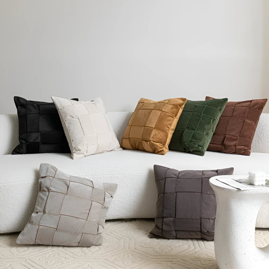 Square chenille woven cushion in a choice of seven colours on a sofa, showing its 50x50cm size and textured fabric.