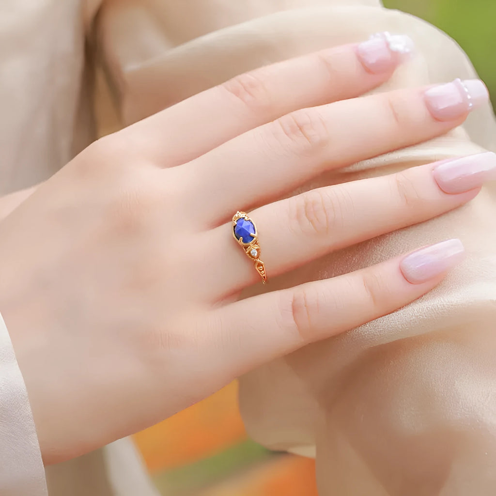 Geometric oval silver alloy ring with lapis lazuli stone centrepiece