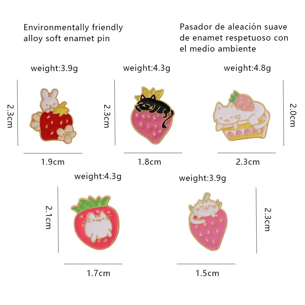 Cat strawberry metal brooch with alloy finish in five colour options on a bag