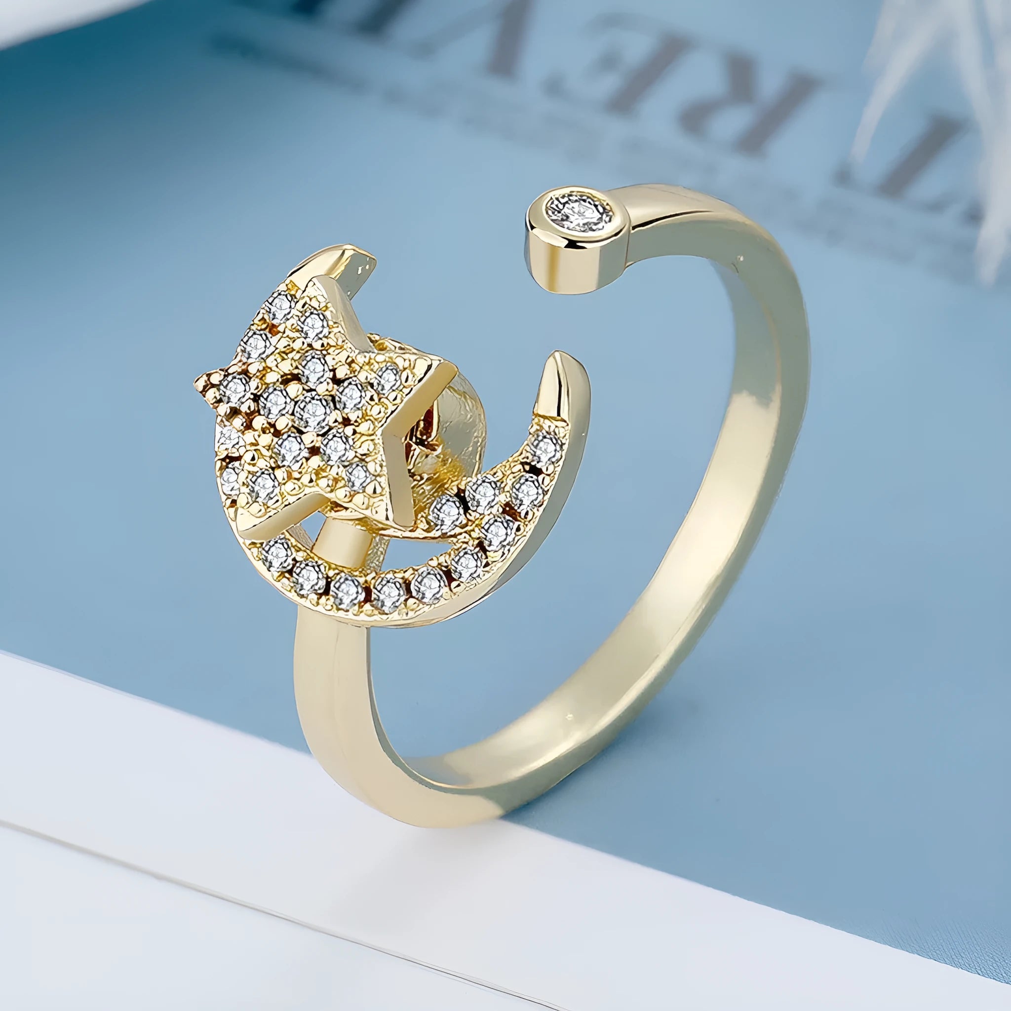 Micro-inlaid free rotating zircon star moon ring for women, gold copper finish, adjustable opening