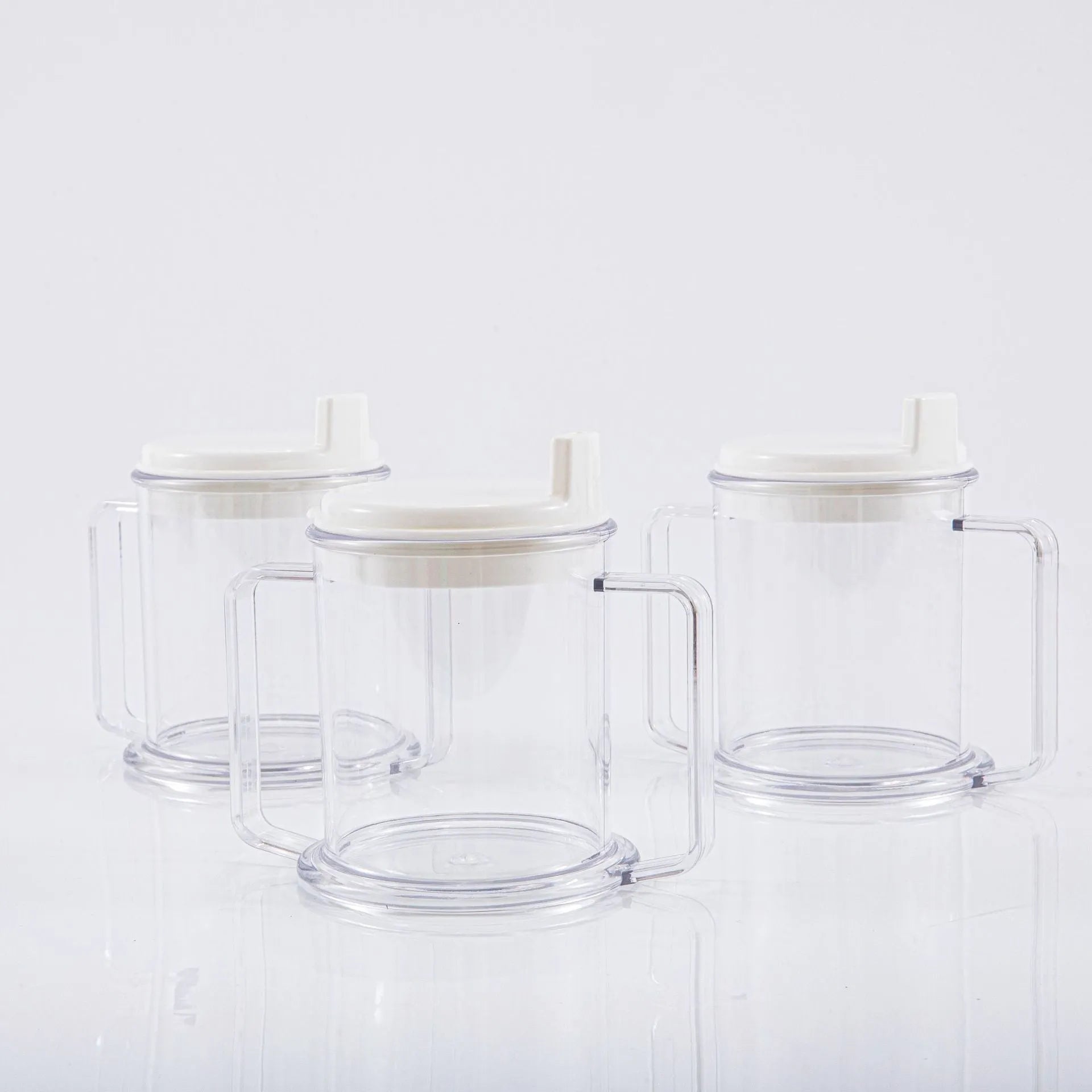 Transparent spill-proof drinking cup with modern design measuring 14cm tall
