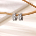 Stainless steel U-shaped ear clip earrings with inlaid zircon detail in colour E5772P