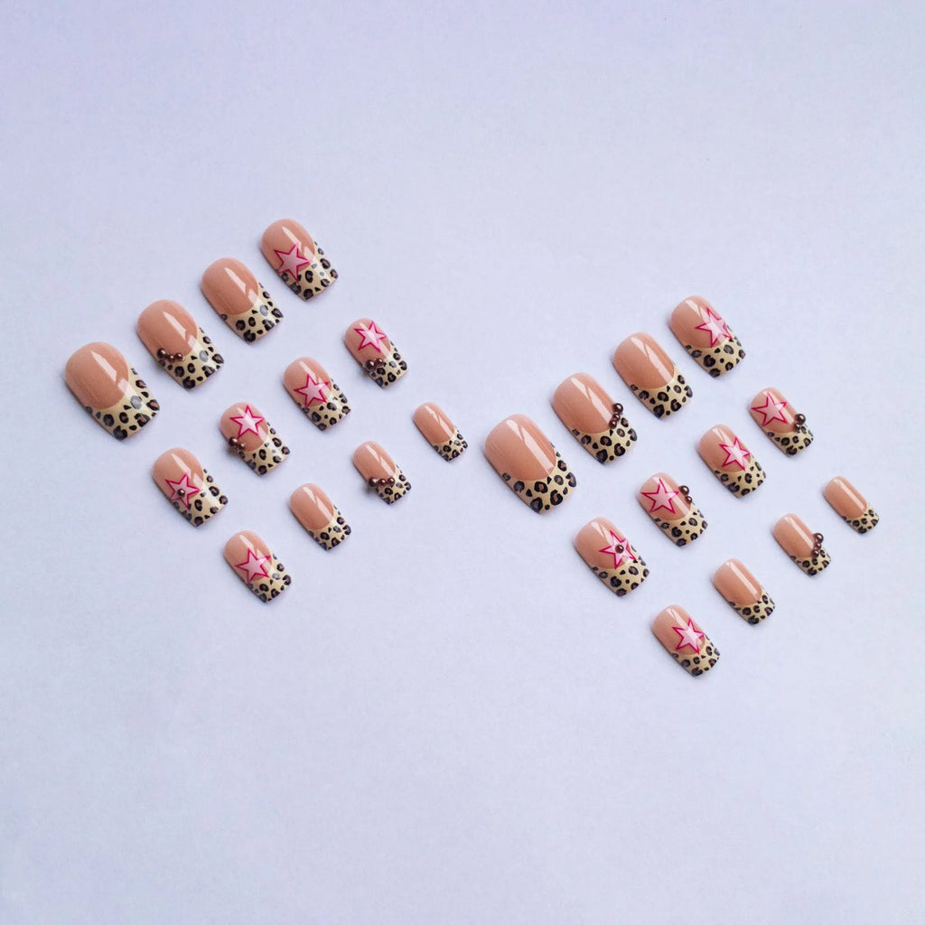 Wear Armor French leopard print five-pointed star press-on nails with pearl and diamond accents