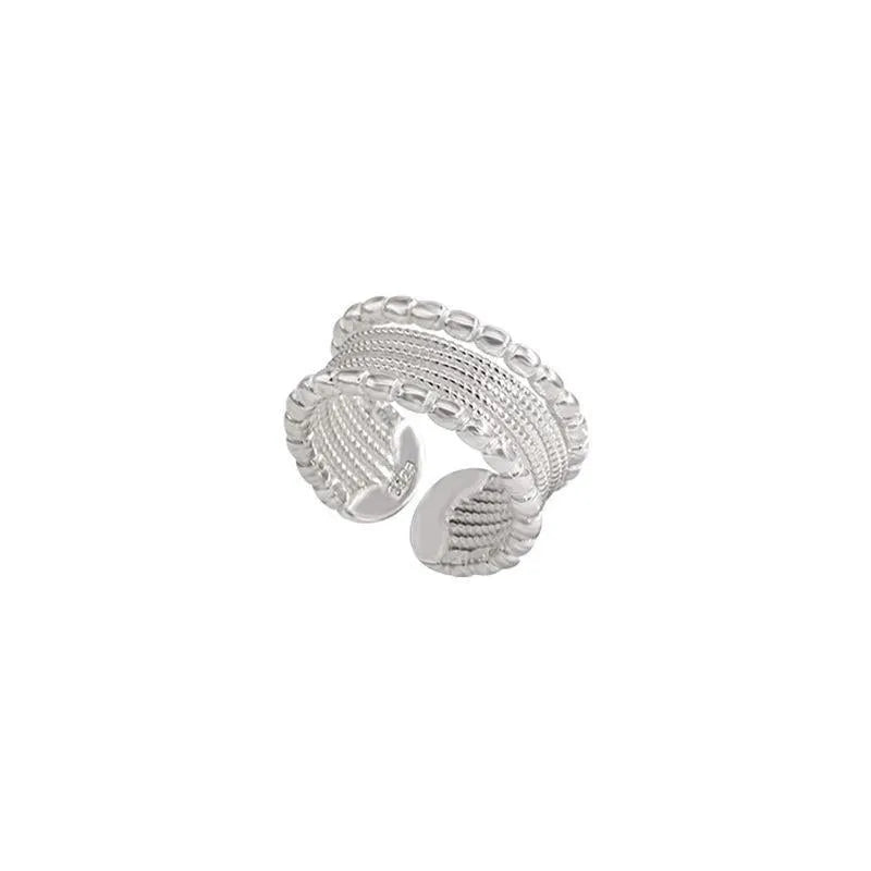 Women's copper alloy ring with woven twisted multilayer geometric design and adjustable opening