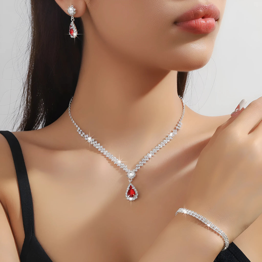Claw chain rhinestone jewellery set with water drop shaped necklace and matching earrings in blue, green, pink, red, or white