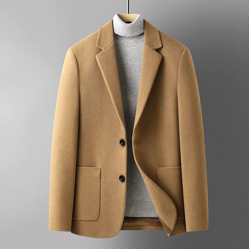 Men's solid colour slim fit wool suit jacket on a hanger.
