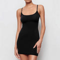 Black sling style sheath dress with skinny silhouette and short skirt length