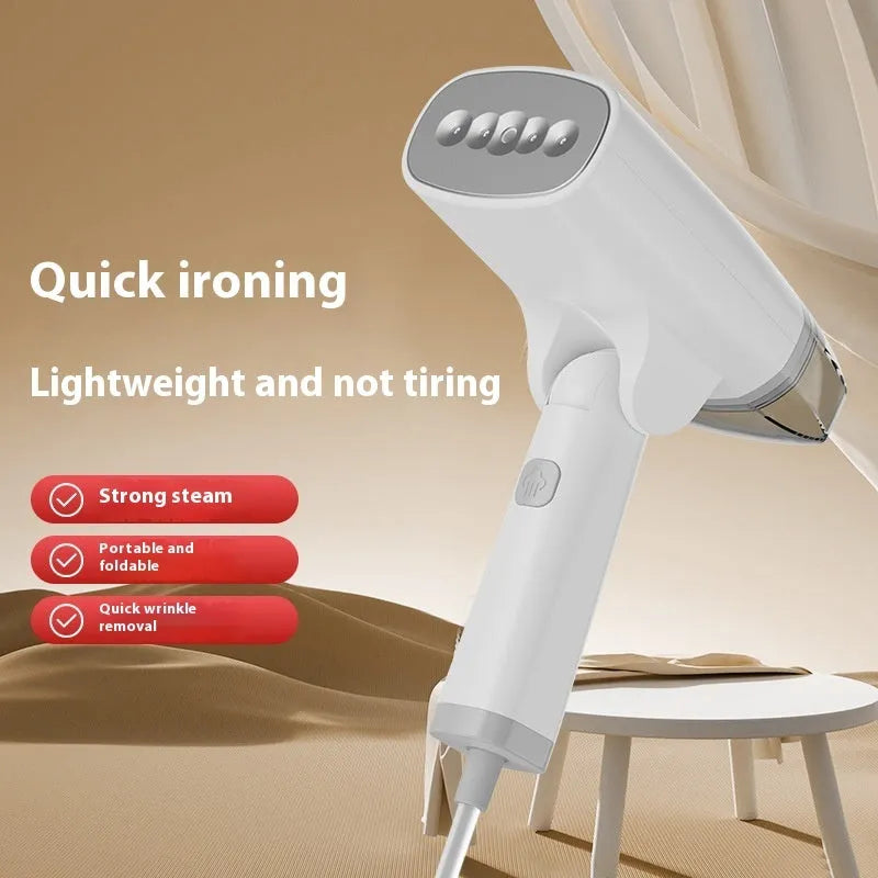 Blue and white handheld garment steamer with temperature control dial and compact 196mm design