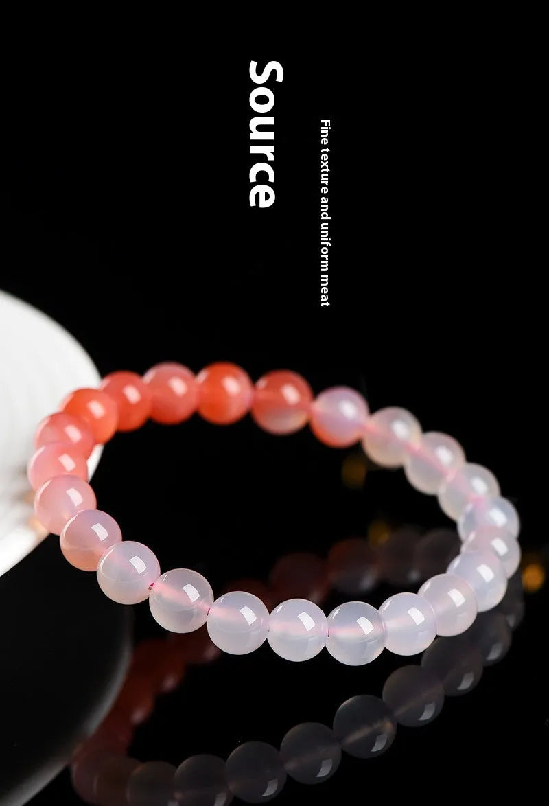 Natural gradient Yanyuan agate bracelet with geometric beads in four size options.