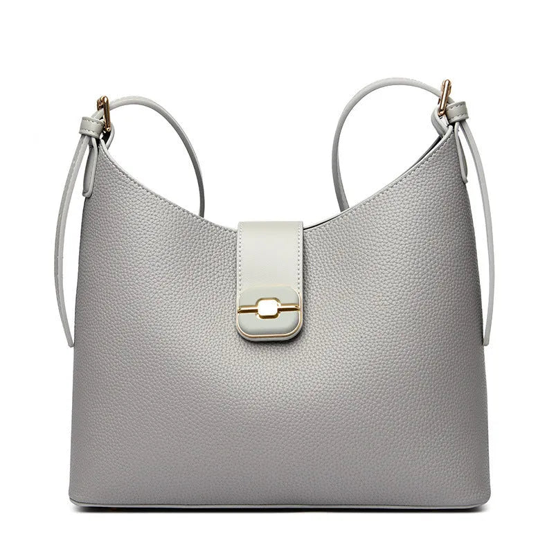 All-matching simple large-capacity bucket bag in black, urban simplicity style with stitching and lock detail