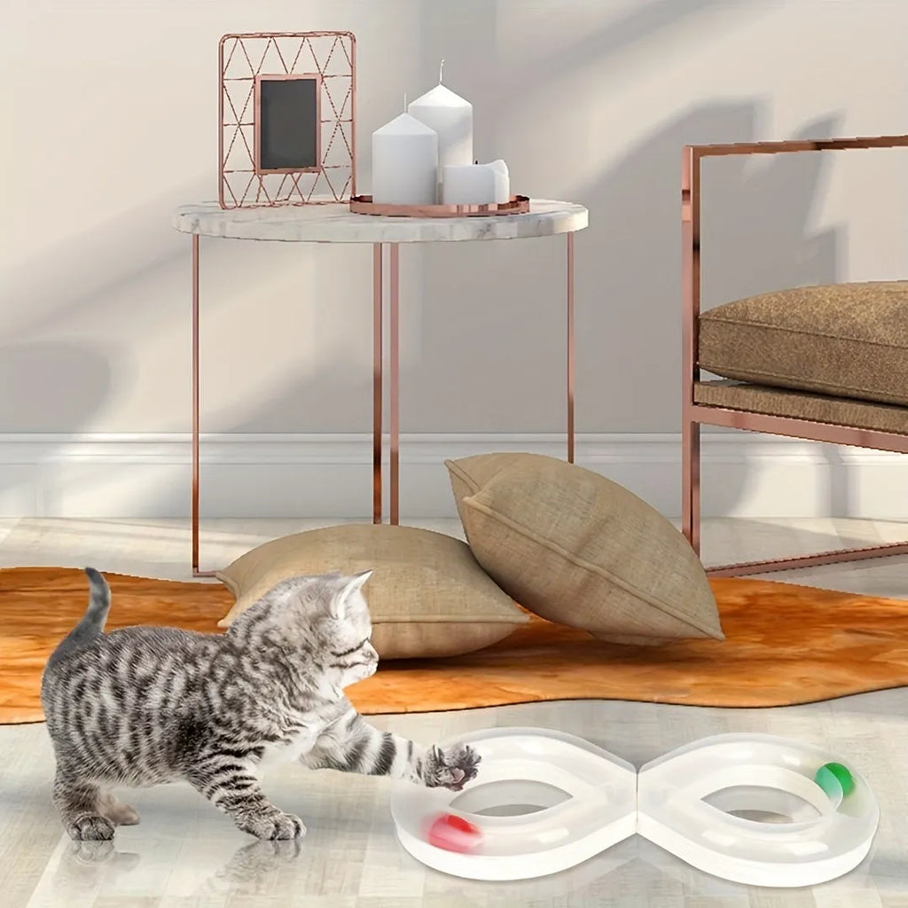 Blue and white cat turntable track ball toy with teasing stick on a flat surface.