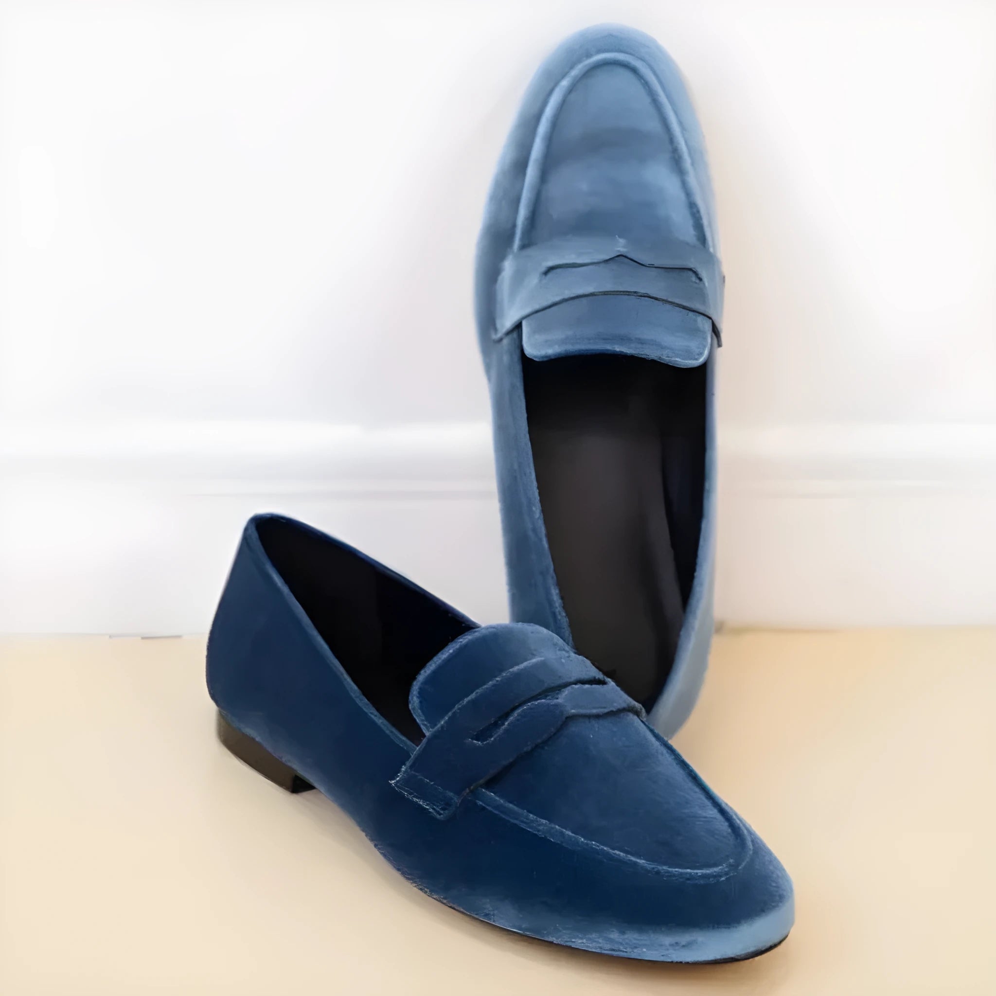 Blue and black sole plus size suede loafers with round toe on a white background