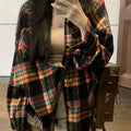 Women's loose-fit long sleeve plaid shirt in cotton, shown in black, green, and purple colour options.