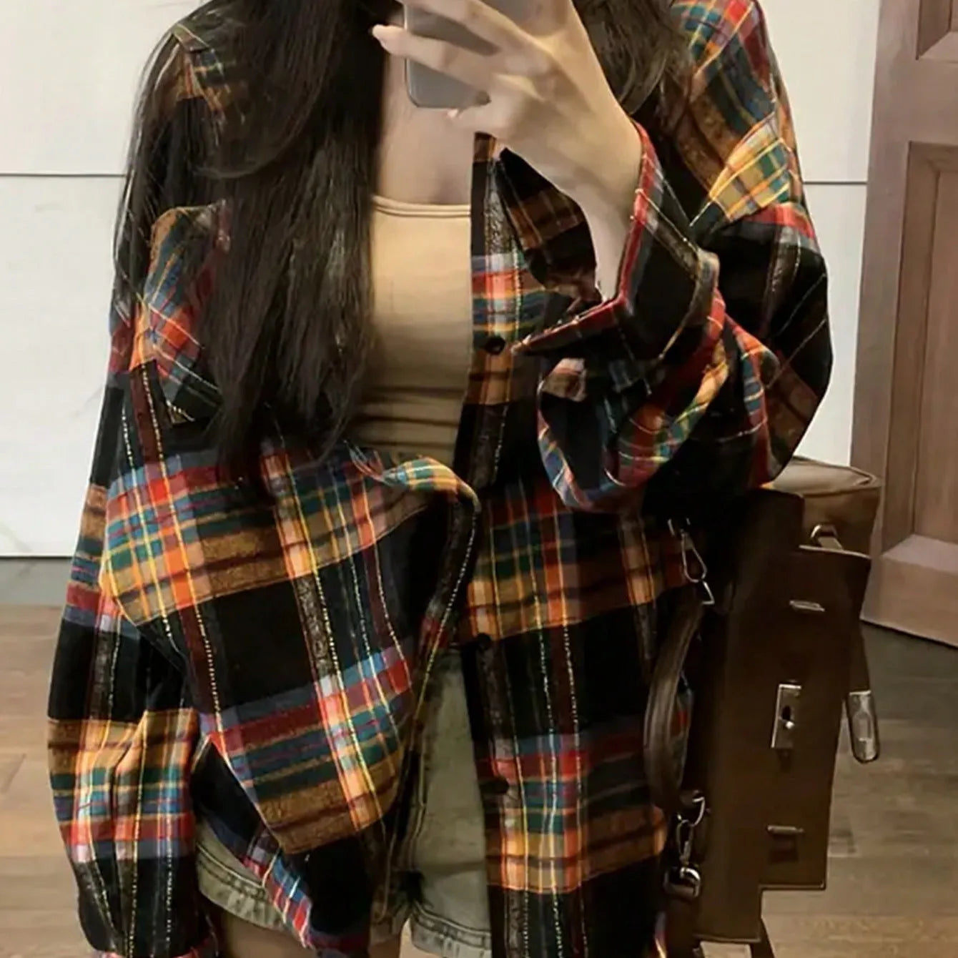 Women's loose-fit long sleeve plaid shirt in cotton, shown in black, green, and purple colour options.