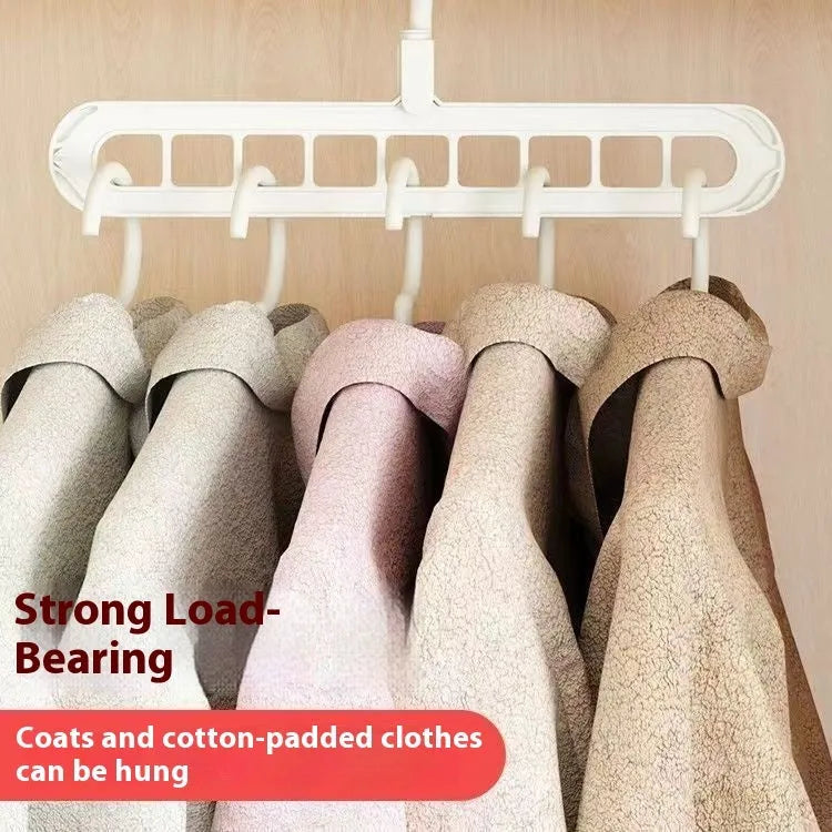 Plastic nine-hole hanger in beige colour showing seamless folding design for trousers