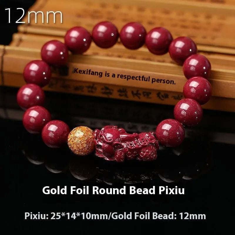Cinnabar bracelet with purple gold sandstone colour, polished finish, and totem pattern on beads