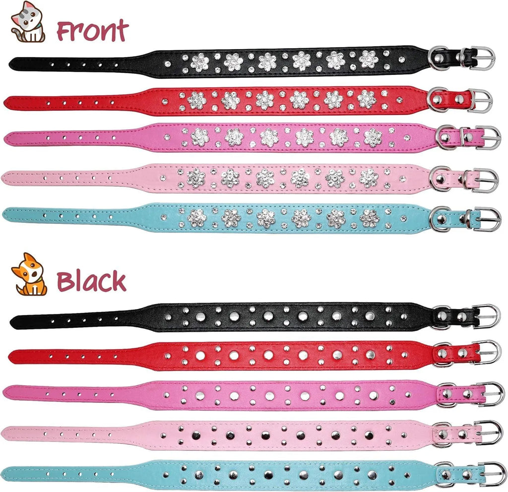 Close-up of a black PU leather dog collar with a studded rhinestone flower pattern and a metal D-ring.