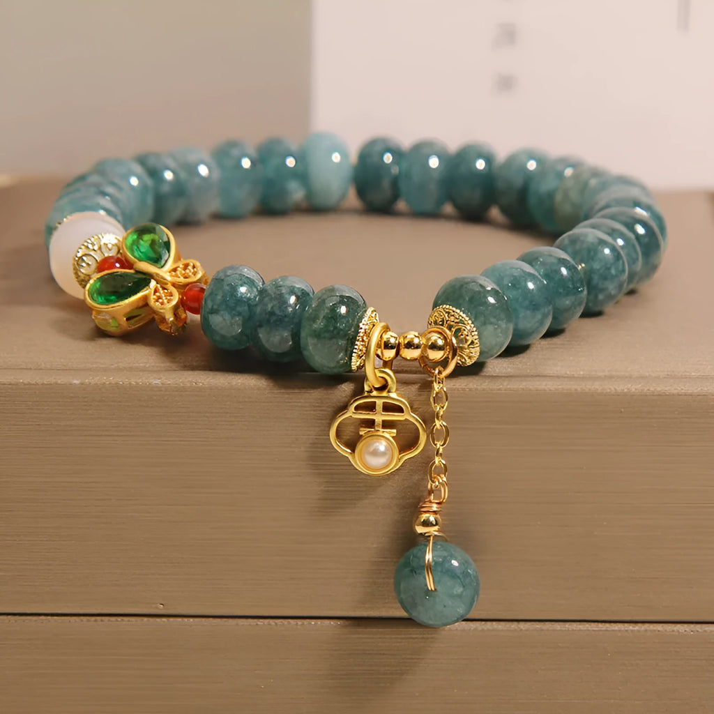 Blue water jade abacus beads crystal bracelet with white agate and butterfly motif on alloy base